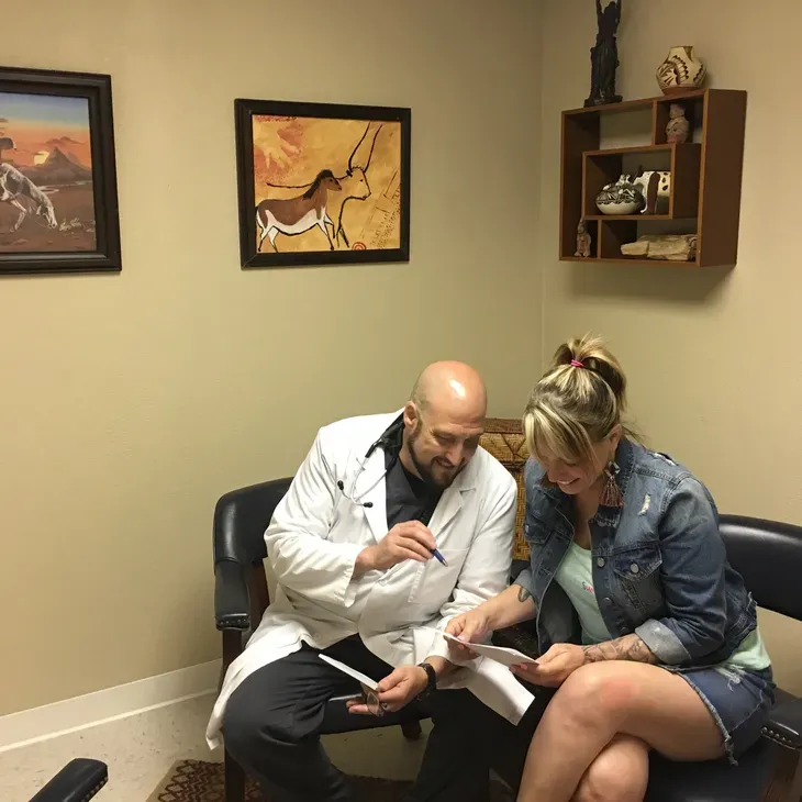 Provider reviewing results with a patient during an autoimmune consultation