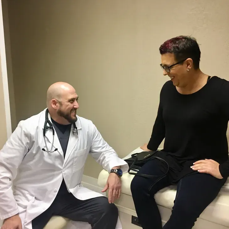 Provider consulting with a patient about hormone replacement therapy